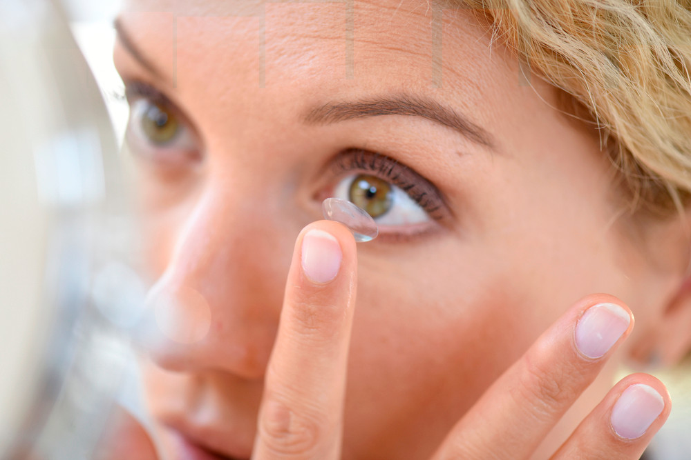 Fitting a contact lens in Hobart.