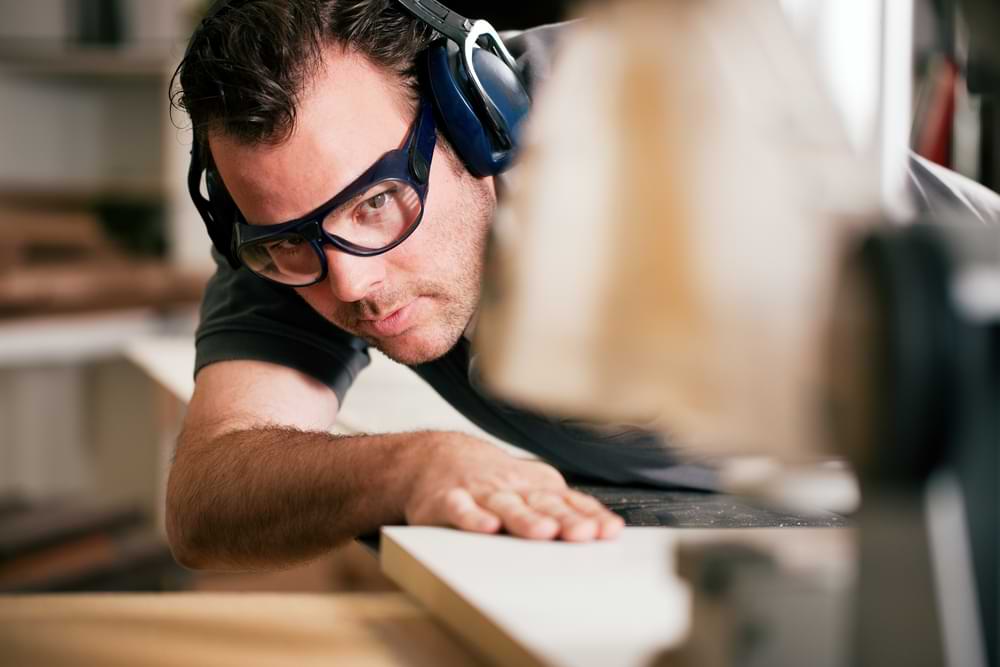 Prescription safety glasses in a Hobart workshop.